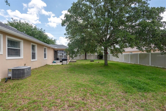 1 Rockwell Ln W, Palm Coast, FL 32164 - view of yard featuring central AC unit