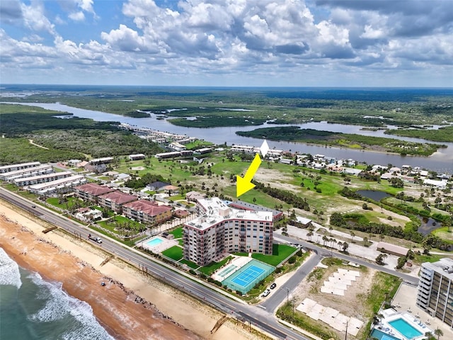 3600 S Ocean Shore Blvd Unit 222, Flagler Beach, FL 32136 - bird's eye view of a nearby body of water and a pool area