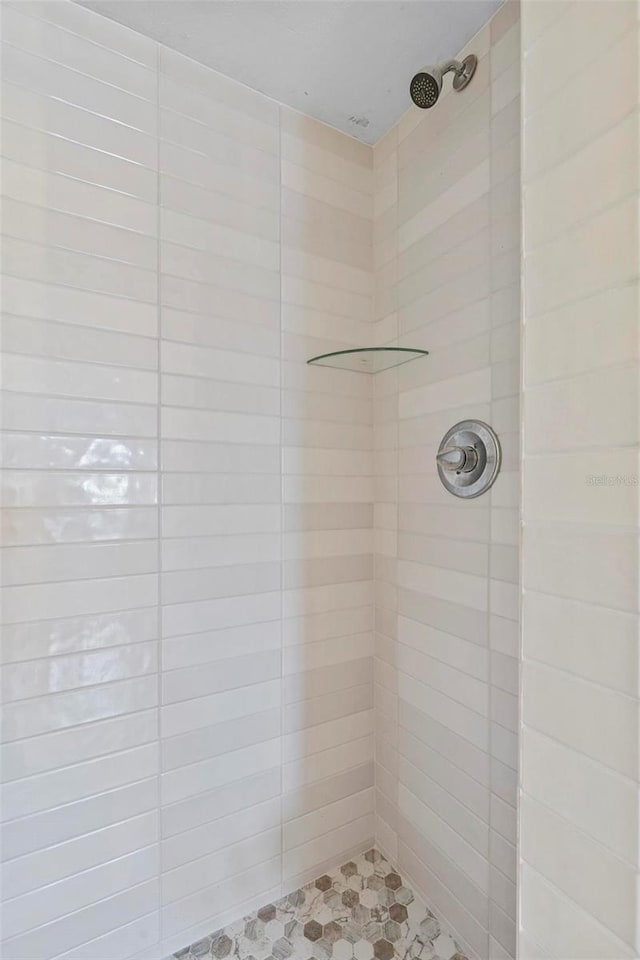 3600 S Ocean Shore Blvd Unit 222, Flagler Beach, FL 32136 - bathroom featuring tiled shower
