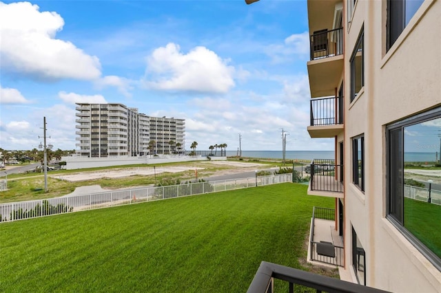 3600 S Ocean Shore Blvd Unit 222, Flagler Beach, FL 32136 - view of yard featuring a balcony and a water view