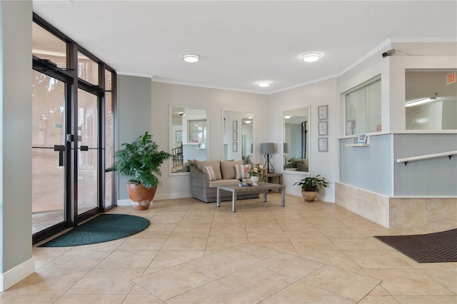 3600 S Ocean Shore Blvd Unit 222, Flagler Beach, FL 32136 - community lobby featuring crown molding and a wall of windows