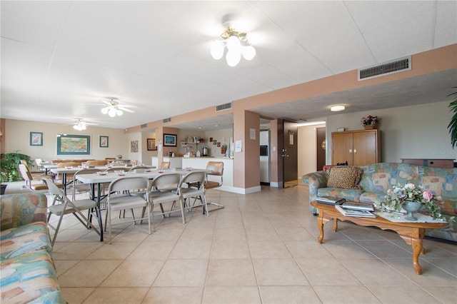 3600 S Ocean Shore Blvd Unit 222, Flagler Beach, FL 32136 - living room featuring light tile patterned flooring and a ceiling fan