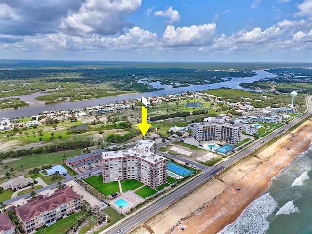 3600 S Ocean Shore Blvd Unit 222, Flagler Beach, FL 32136 - drone / aerial view of a large body of water and apartment complex