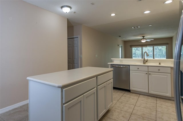 1100 Canopy Walk Ln Unit 1113, Palm Coast, FL 32137 - kitchen featuring dishwasher, a ceiling fan, light tile patterned floors, a center island, and light countertops