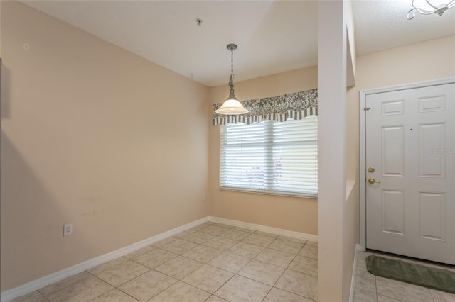 1100 Canopy Walk Ln Unit 1113, Palm Coast, FL 32137 - foyer with light tile patterned floors and baseboards