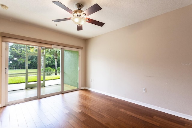 1100 Canopy Walk Ln Unit 1113, Palm Coast, FL 32137 - spare room featuring wood finished floors, baseboards, and a ceiling fan