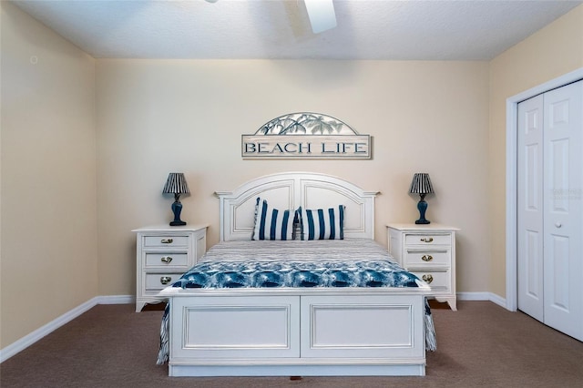 1100 Canopy Walk Ln Unit 1113, Palm Coast, FL 32137 - bedroom featuring dark colored carpet, baseboards, ceiling fan, and a closet