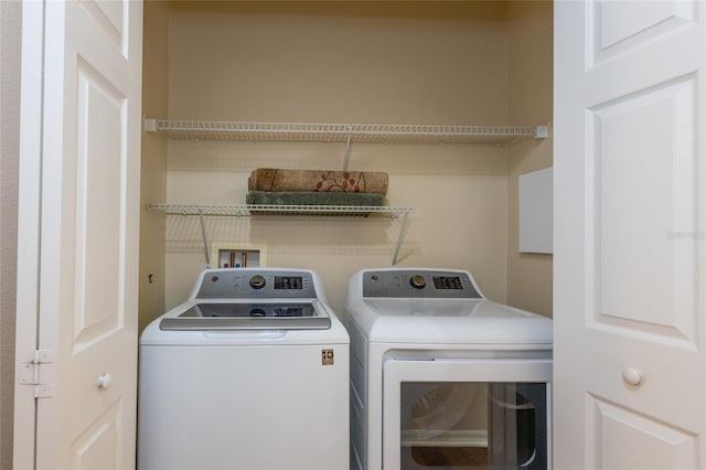 1100 Canopy Walk Ln Unit 1113, Palm Coast, FL 32137 - laundry room with washing machine and dryer