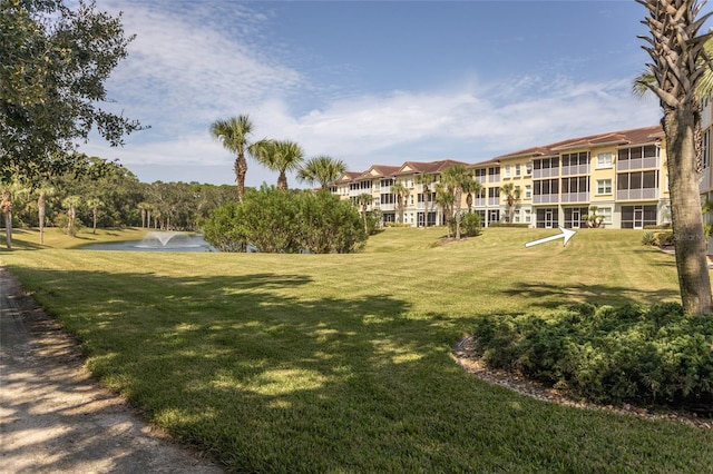 1100 Canopy Walk Ln Unit 1113, Palm Coast, FL 32137 - view of property's community with a yard and a water view