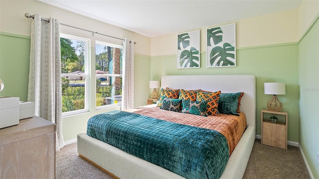 115 Wellwood Ln Unit A, Palm Coast, FL 32164 - bedroom with carpet floors and baseboards