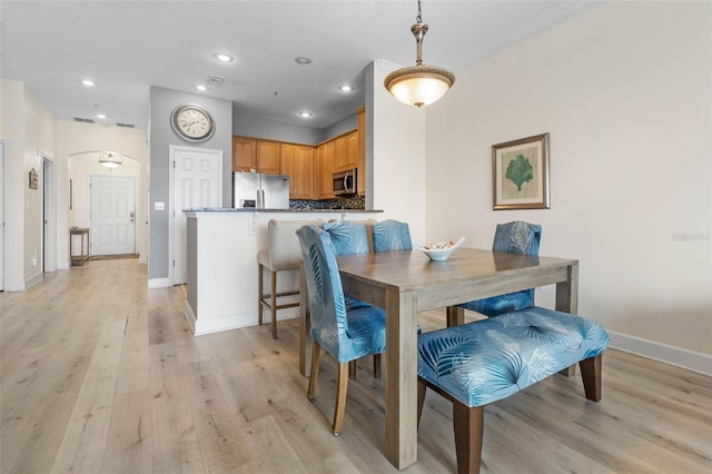 1200 Cinnamon Beach Way Unit 1133, Palm Coast, FL 32137 - dining room featuring light wood-style flooring, baseboards, and recessed lighting
