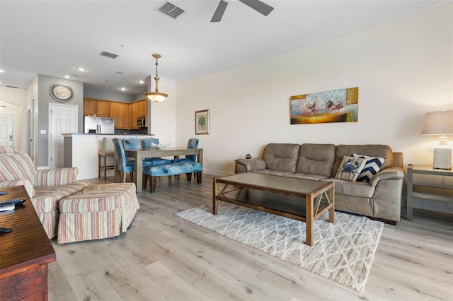 1200 Cinnamon Beach Way Unit 1133, Palm Coast, FL 32137 - living room with ceiling fan, light wood-type flooring, recessed lighting, and baseboards