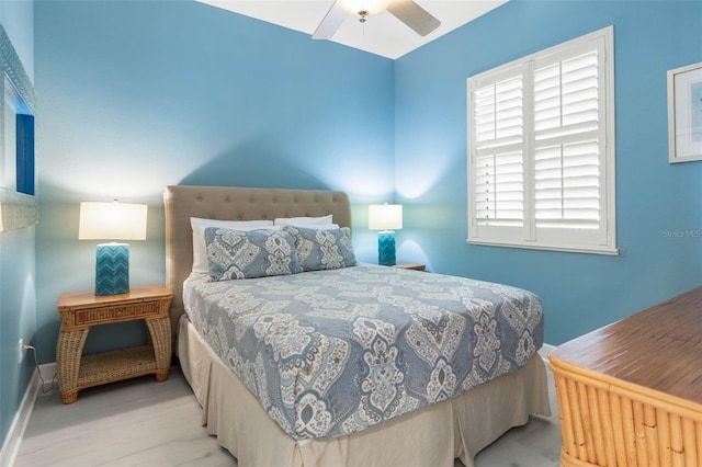 1200 Cinnamon Beach Way Unit 1133, Palm Coast, FL 32137 - bedroom featuring wood finished floors, baseboards, and a ceiling fan