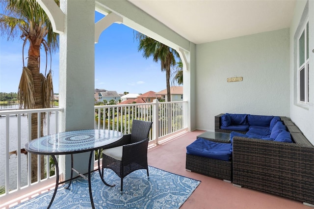 1200 Cinnamon Beach Way Unit 1133, Palm Coast, FL 32137 - balcony featuring a water view and an outdoor living space