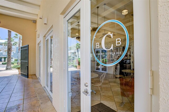 1200 Cinnamon Beach Way Unit 1133, Palm Coast, FL 32137 - entryway featuring healthy amount of natural light and french doors