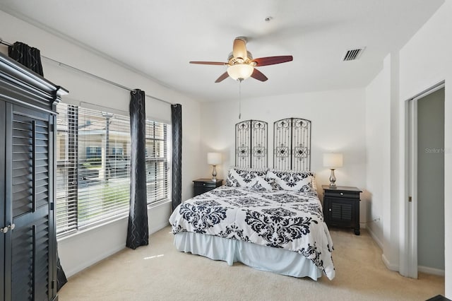 300 Via Castilla Unit 103, Saint Augustine, FL 32095 - bedroom featuring baseboards, carpet, and a ceiling fan