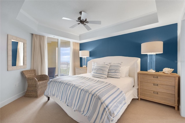 200 Ocean Crest Dr Unit 605, Palm Coast, FL 32137 - carpeted bedroom featuring crown molding, a tray ceiling, and ceiling fan