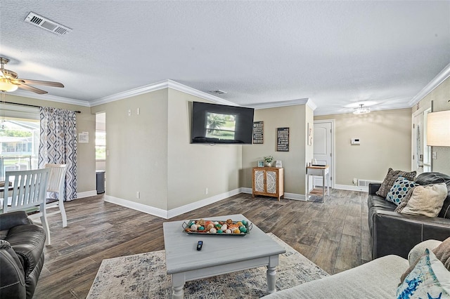 7 Fleming Ct, Palm Coast, FL 32137 - living room featuring a textured ceiling, ceiling fan, wood finished floors, crown molding, and baseboards