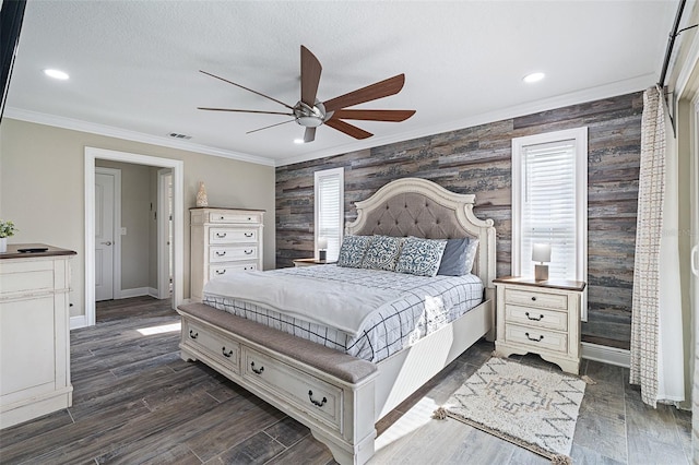 7 Fleming Ct, Palm Coast, FL 32137 - bedroom featuring an accent wall, baseboards, wallpapered walls, ornamental molding, and recessed lighting