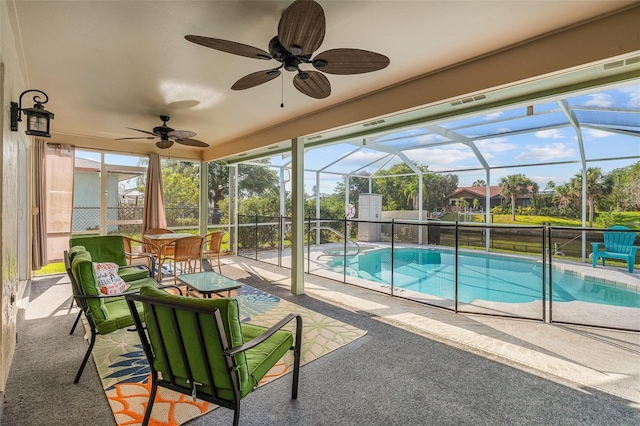 7 Fleming Ct, Palm Coast, FL 32137 - outdoor pool with a ceiling fan, a patio, and glass enclosure