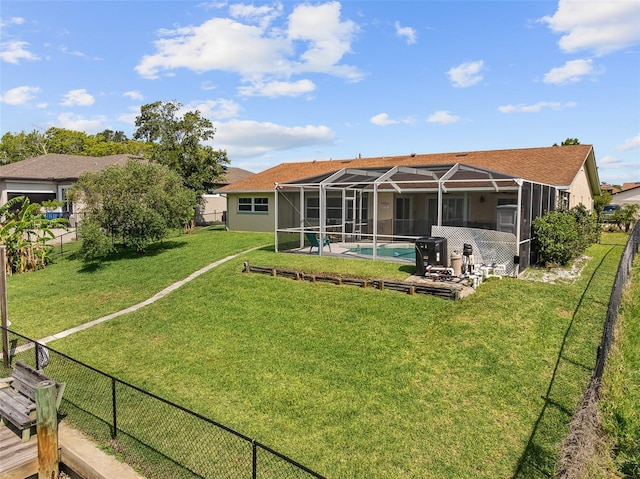 7 Fleming Ct, Palm Coast, FL 32137 - rear view of house featuring glass enclosure and a patio area