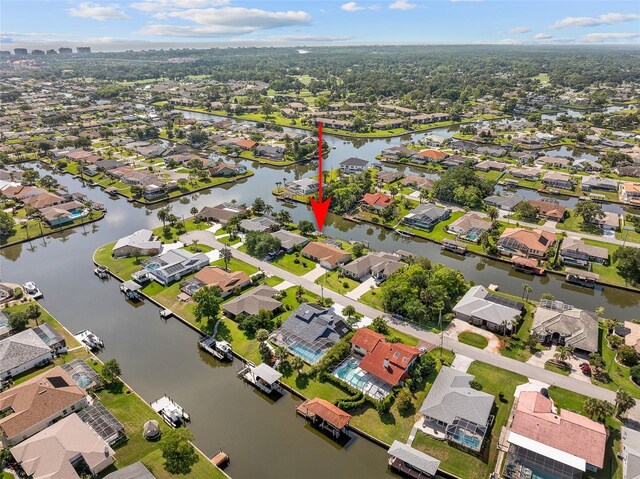 7 Fleming Ct, Palm Coast, FL 32137 - aerial view of residential area with a large body of water