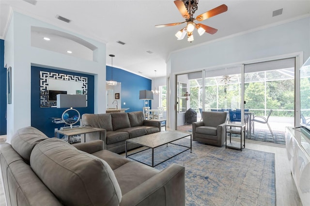 115 Bay Lake Dr, Ormond Beach, FL 32174 - living room with ornamental molding, ceiling fan, wood finished floors, a sunroom, and recessed lighting