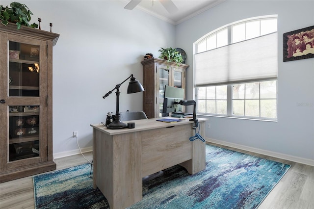 115 Bay Lake Dr, Ormond Beach, FL 32174 - office area with crown molding, light wood-style floors, plenty of natural light, a ceiling fan, and baseboards