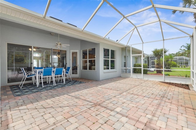 115 Bay Lake Dr, Ormond Beach, FL 32174 - sunroom / solarium featuring a ceiling fan and outdoor dining space