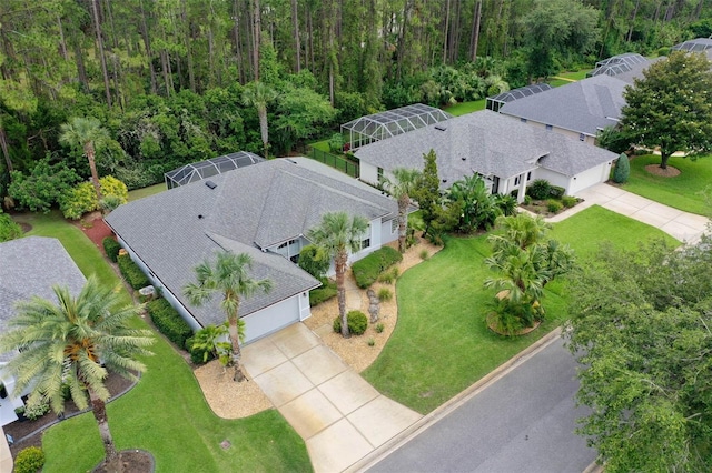 115 Bay Lake Dr, Ormond Beach, FL 32174 - view of subject property with a heavily wooded area