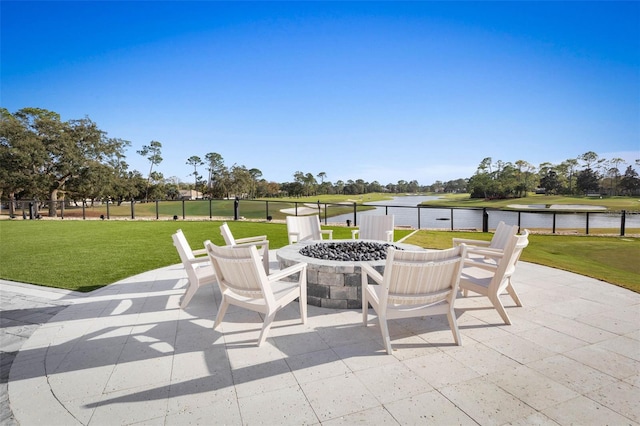 115 Bay Lake Dr, Ormond Beach, FL 32174 - view of patio with a water view and a fire pit