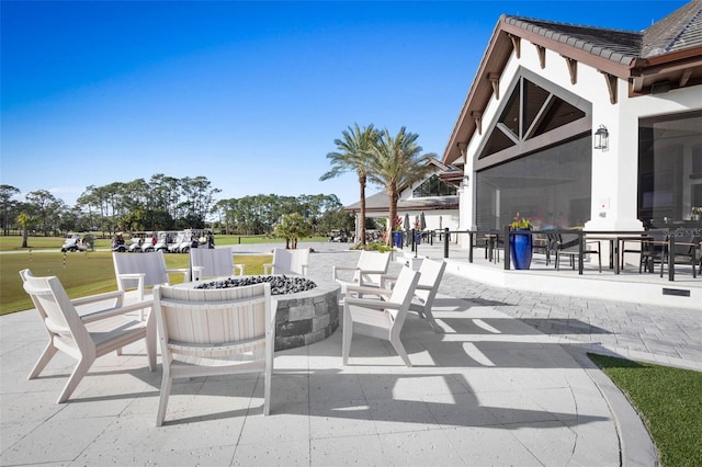 115 Bay Lake Dr, Ormond Beach, FL 32174 - view of patio / terrace with a fire pit