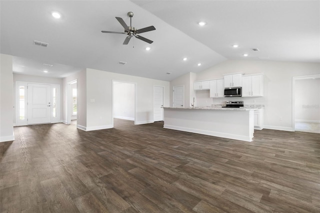 6 Squanto Pl, Palm Coast, FL 32164 - unfurnished living room with ceiling fan, dark wood-type flooring, baseboards, recessed lighting, and a sink