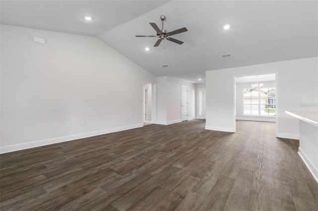 6 Squanto Pl, Palm Coast, FL 32164 - unfurnished living room featuring a chandelier, vaulted ceiling, dark wood-type flooring, a ceiling fan, and recessed lighting