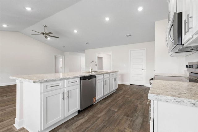 6 Squanto Pl, Palm Coast, FL 32164 - kitchen featuring stainless steel appliances, a sink, a ceiling fan, dark wood-style flooring, and white cabinetry