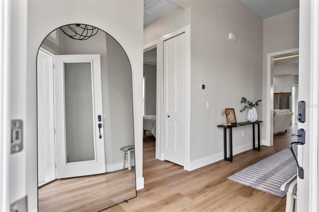 56 Columbia Ln, Palm Coast, FL 32137 - entryway with wood finished floors and arched walkways