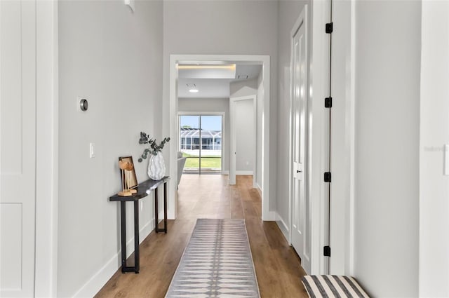 56 Columbia Ln, Palm Coast, FL 32137 - corridor featuring wood finished floors and baseboards