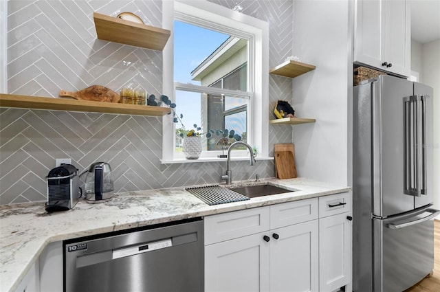 56 Columbia Ln, Palm Coast, FL 32137 - kitchen featuring open shelves, stainless steel appliances, decorative backsplash, and white cabinets