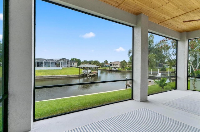 56 Columbia Ln, Palm Coast, FL 32137 - unfurnished sunroom featuring a water view and a residential view