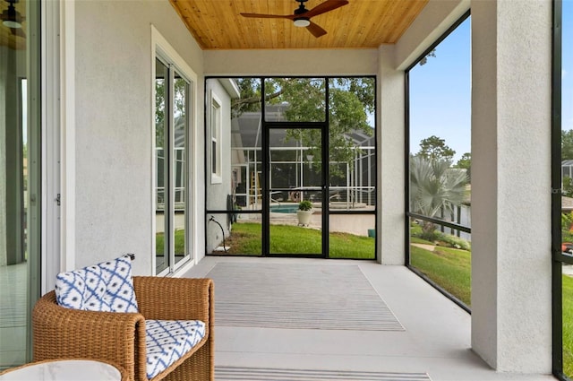 56 Columbia Ln, Palm Coast, FL 32137 - sunroom featuring ceiling fan and healthy amount of natural light