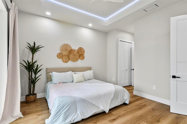 56 Columbia Ln, Palm Coast, FL 32137 - bedroom with recessed lighting, light wood-type flooring, and a closet