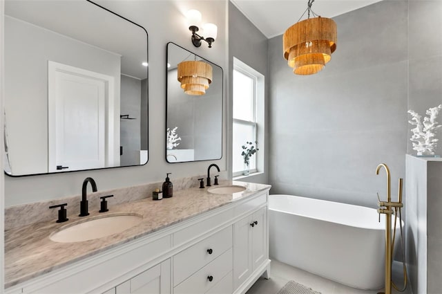 56 Columbia Ln, Palm Coast, FL 32137 - full bathroom featuring a soaking tub, double vanity, and tile patterned floors