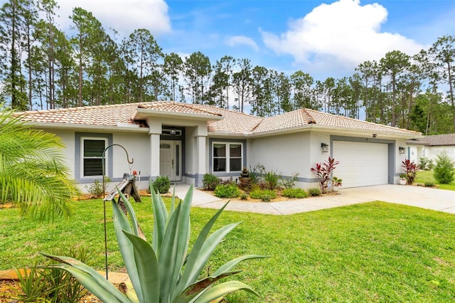 82 Ryland Dr, Palm Coast, FL 32164 - view of front of house featuring a tile roof, a garage, stucco siding, concrete driveway, and a front lawn