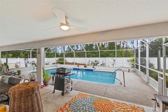 82 Ryland Dr, Palm Coast, FL 32164 - view of swimming pool featuring a grill, a fenced backyard, a patio, and glass enclosure