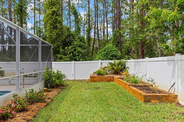 82 Ryland Dr, Palm Coast, FL 32164 - view of yard with a garden and a lanai