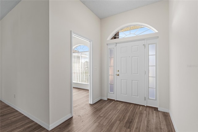 16 Flemington Ln, Palm Coast, FL 32137 - entrance foyer featuring wood finished floors and baseboards