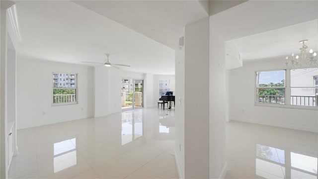 1 John Anderson Dr Unit 2180, Ormond Beach, FL 32176 - unfurnished room featuring a chandelier, light tile patterned flooring, and a ceiling fan