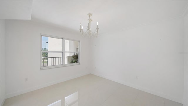 1 John Anderson Dr Unit 2180, Ormond Beach, FL 32176 - spare room with a chandelier, baseboards, light tile patterned floors, and crown molding