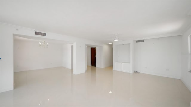 1 John Anderson Dr Unit 2180, Ormond Beach, FL 32176 - empty room with a ceiling fan, a chandelier, and ornamental molding