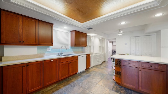 1 John Anderson Dr Unit 2180, Ormond Beach, FL 32176 - kitchen with a sink, dishwasher, a raised ceiling, ceiling fan, and light countertops